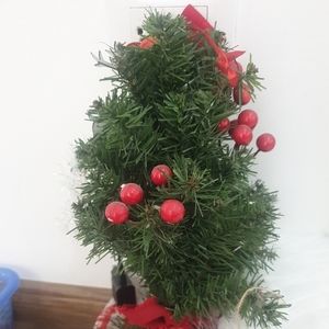 Small self-decorated Christmas tree